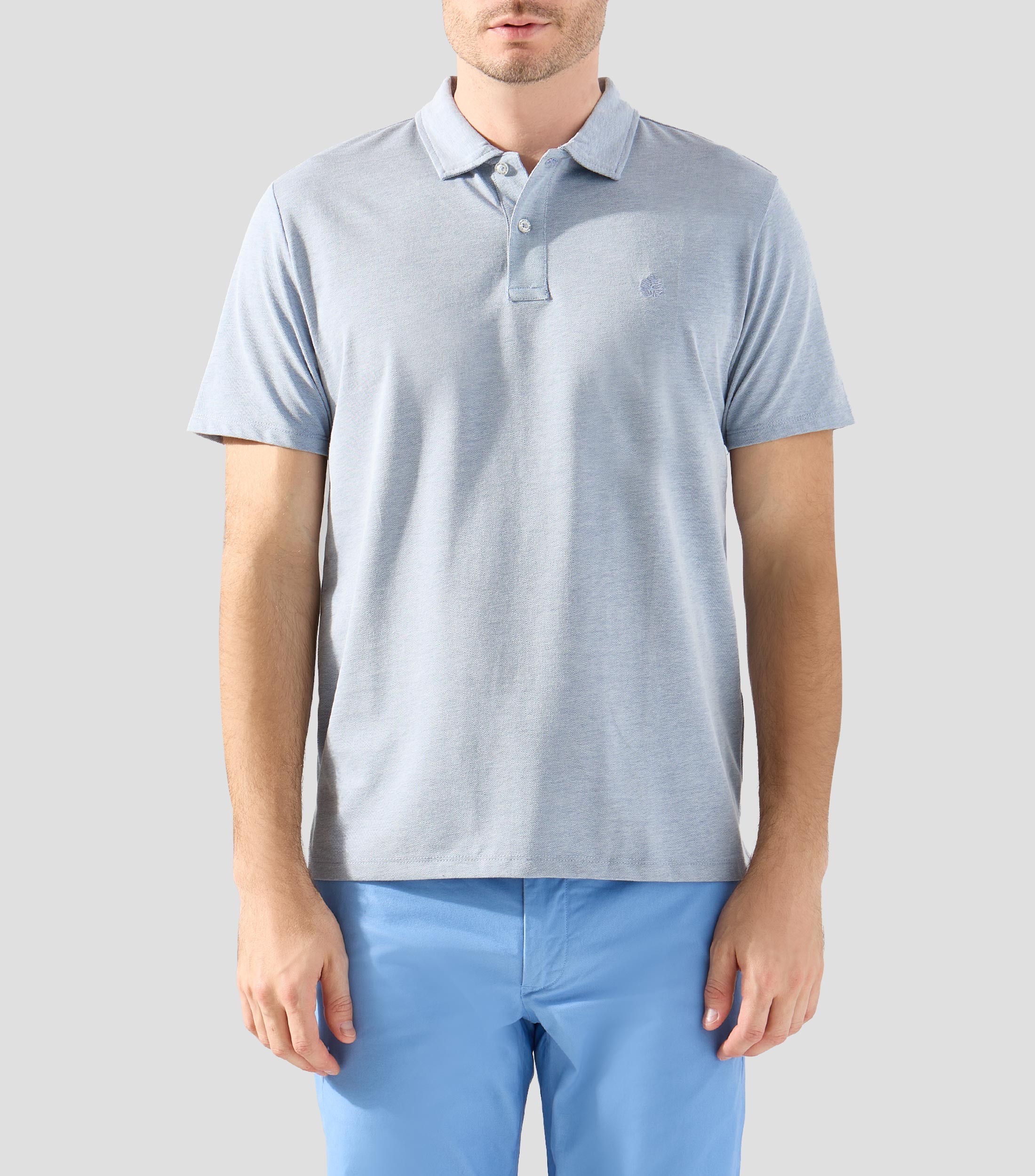 Playera tipo polo manga corta diseño liso Hombre